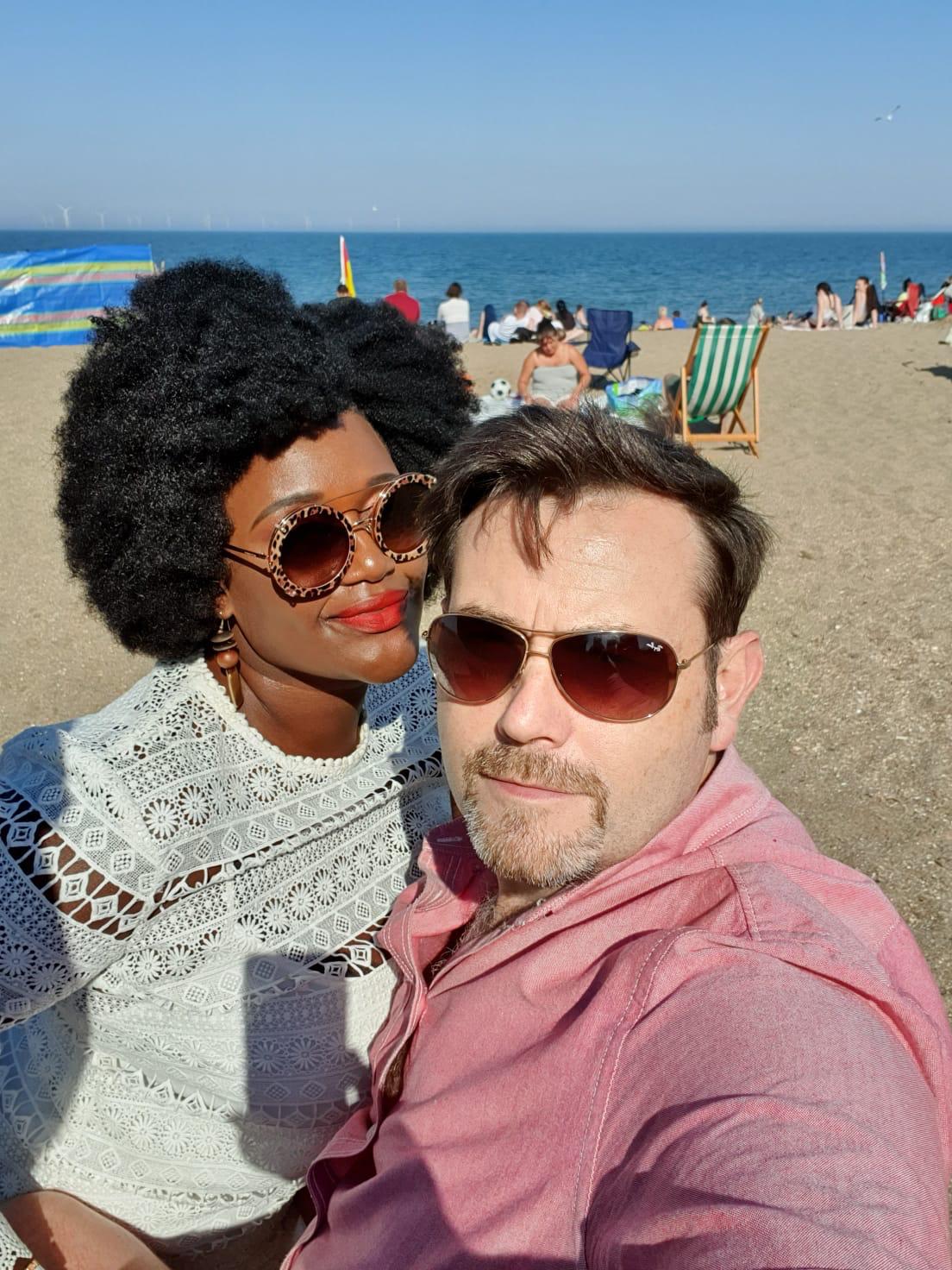A couple from different cultures embracing